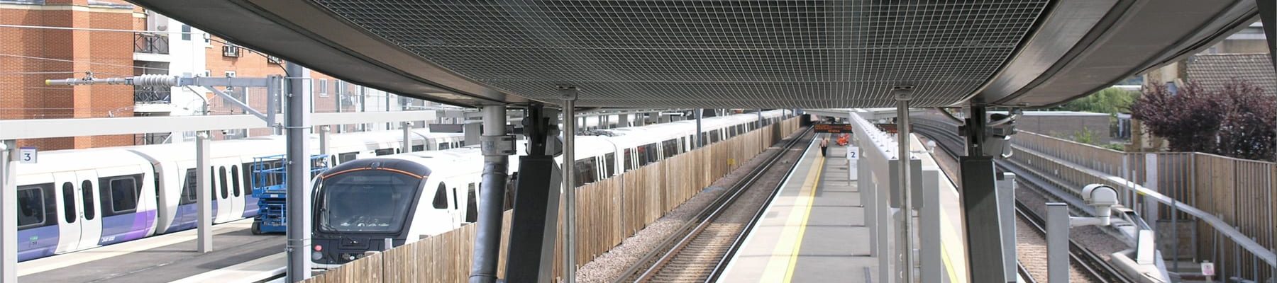 Stretto 22 bespoke 66x22 ceiling panels Abbey Wood Station 1 B Stretto 22 bespoke 66x22 ceiling panels Abbey Wood Station 1 B
